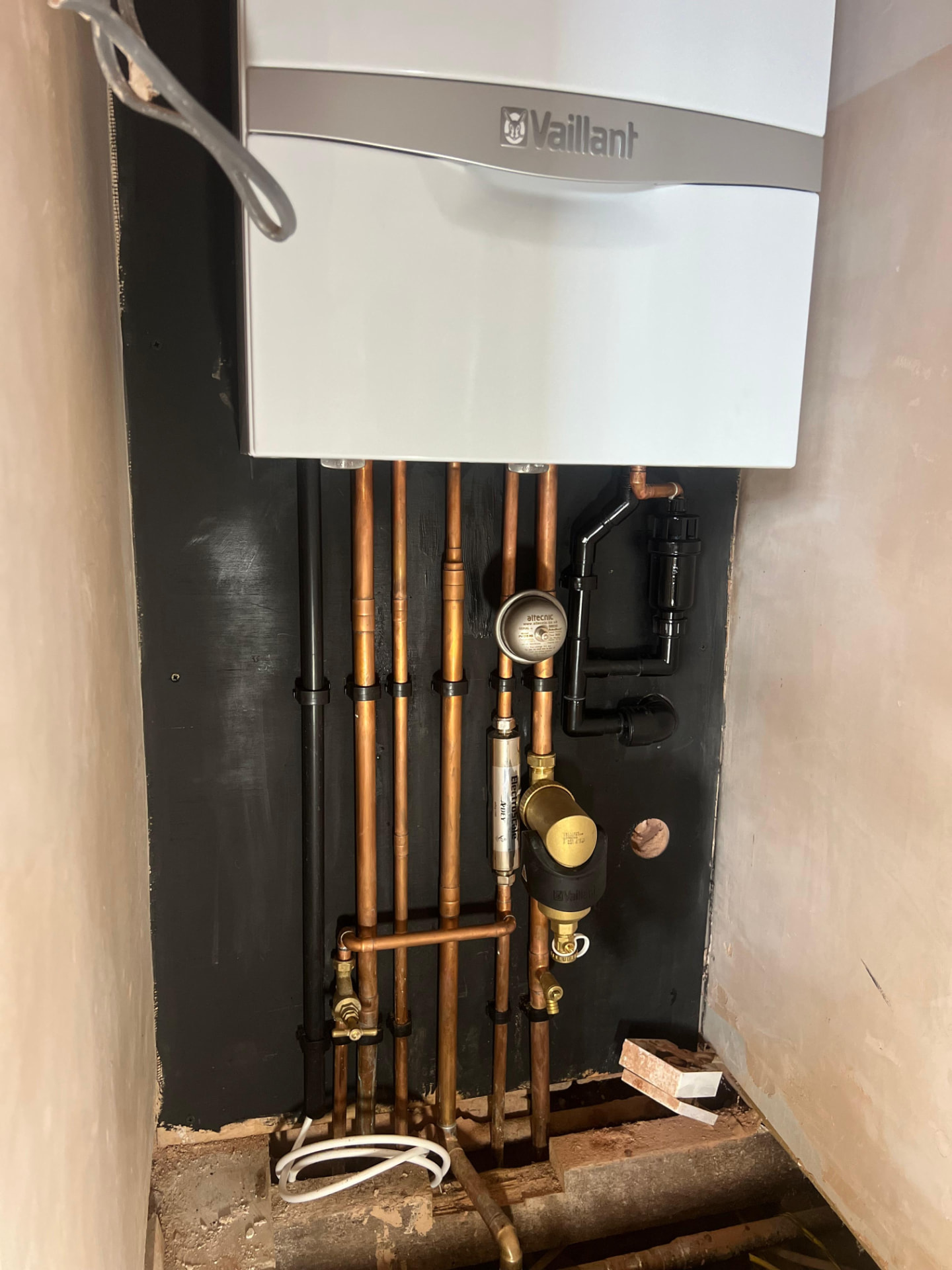 Boiler and copper pipework installed by TREPP & CO in a North London property